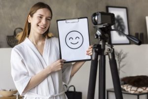 young blogger recording video from home